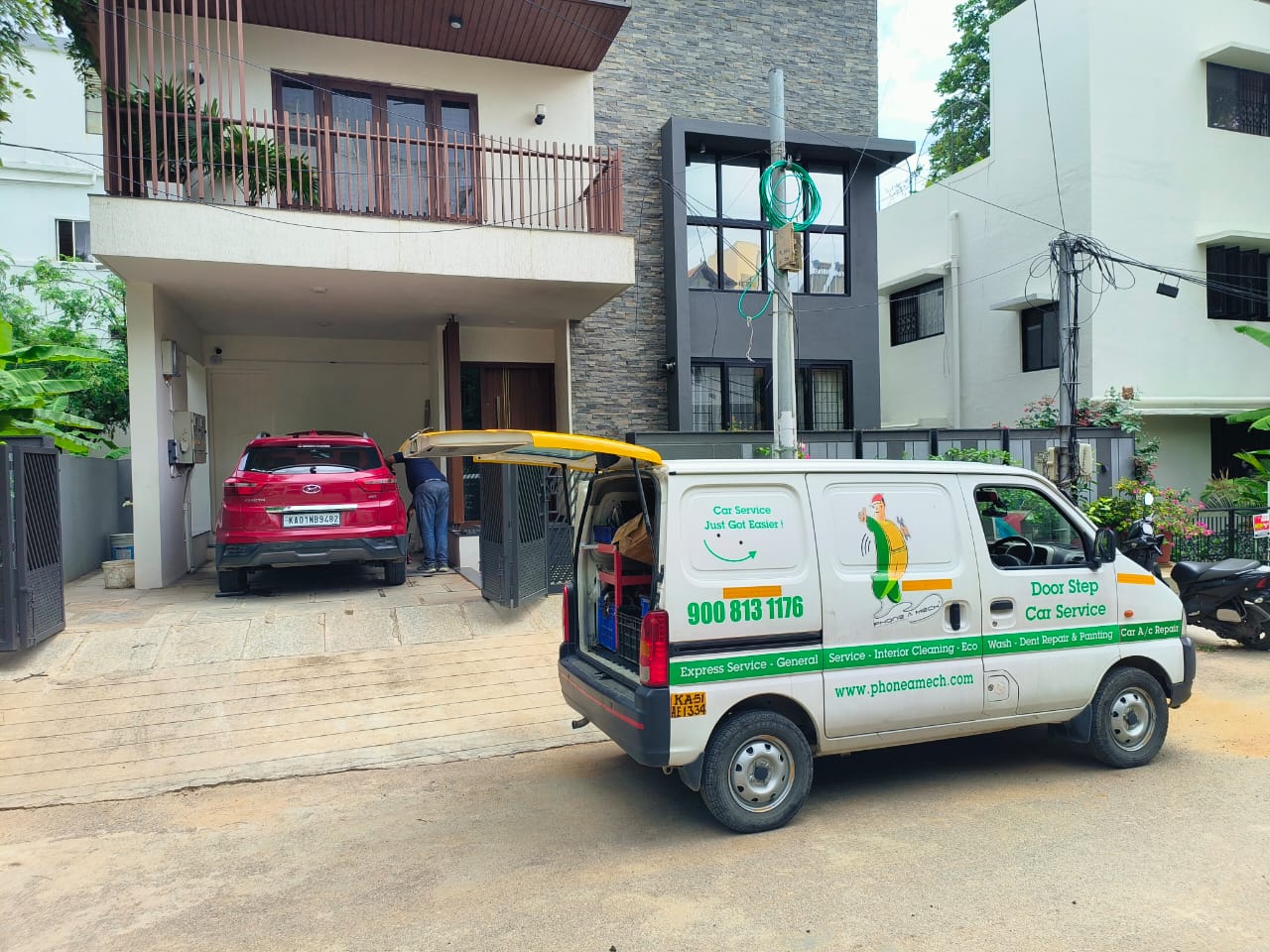 Phone A Mech service van at customer doorstep performing car service in Bangalore